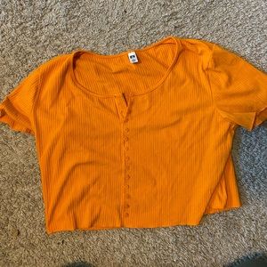Bright orange top